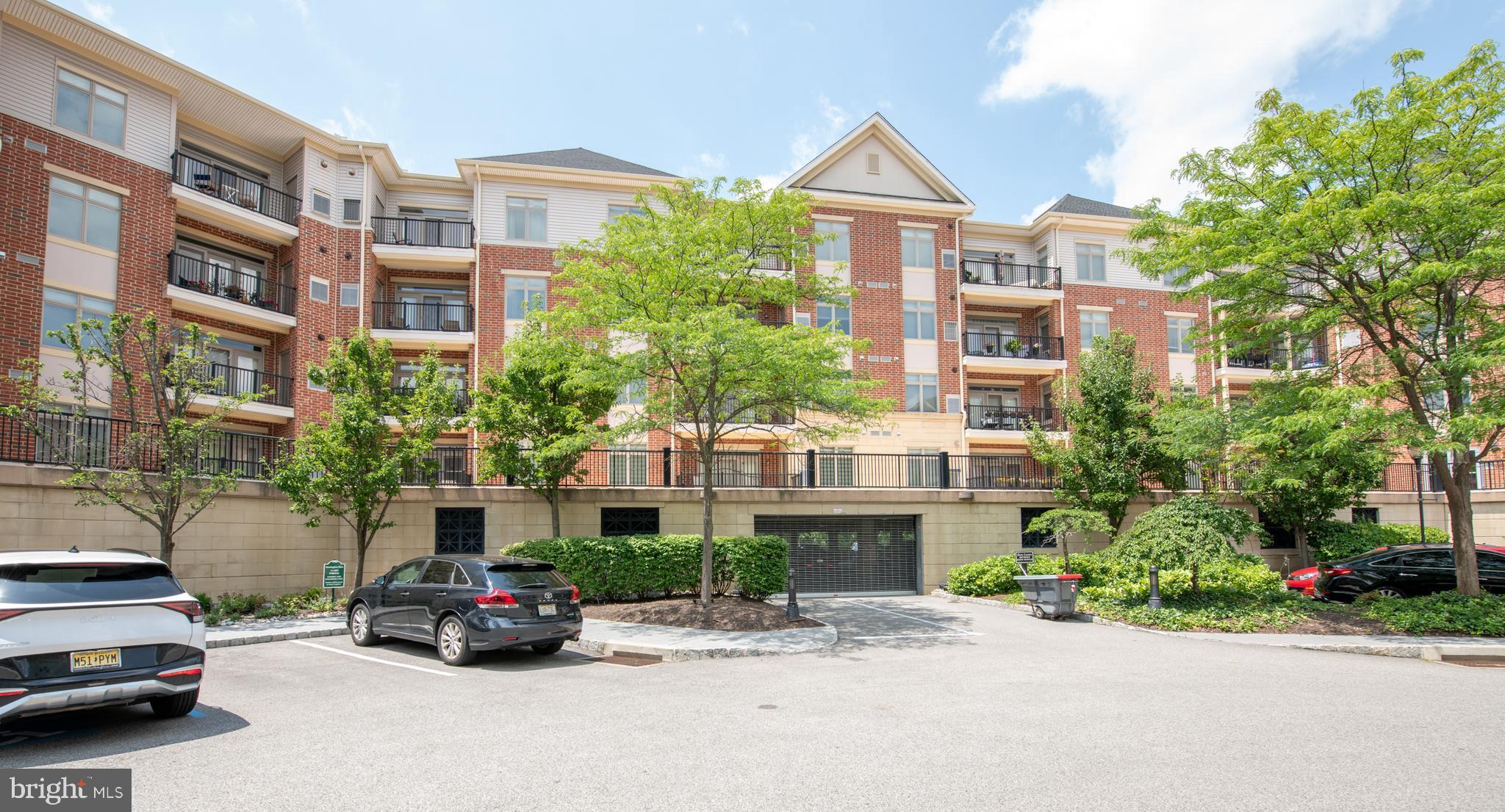 You won't be disappointed with this lovely 2 bedroom, 2 full baths condo with a spectacular water views of the community pond in the desirable Huntingdon Place in Huntingdon Valley in the highly rated Lower Moreland school district. The building hallways have been recently updated with new carpet and paint with a fresh modern look. When you enter this bright, cheerful unit you'll find an open floor plan with a large kitchen with hardwood floors, wood cabinets, tile backsplash, stainless steel appliances, gas cooking, recessed lights and ample counter space with seating. The dining area has custom built-ins for your dining storage needs. The spacious living room has a sliding glass door to a large balcony overlooking the tranquil pond, a wonderful spot to relax and enjoy the outdoors. The primary bedroom has 2 professionally outfitted walk-in closets and an updated primacy bath with double sink vanity and soaking tub. Bedroom 2 has a large closet, recessed lights direct access to the updated hall bathroom with vanity sink and tub/shower. Additional features: in unit laundry with washer & dryer included as is.; all custom Hunter-Douglas window treatments included as is; deeded garage parking space; HVAC replaced 6 months ago; secure building with 24 hr attendant; amenities include: fitness room, heated indoor pool and meeting rooms; convenient location close to shopping, restaurants, major road access, train station, Pennypack trails and so much more!! Make you appointment today!!