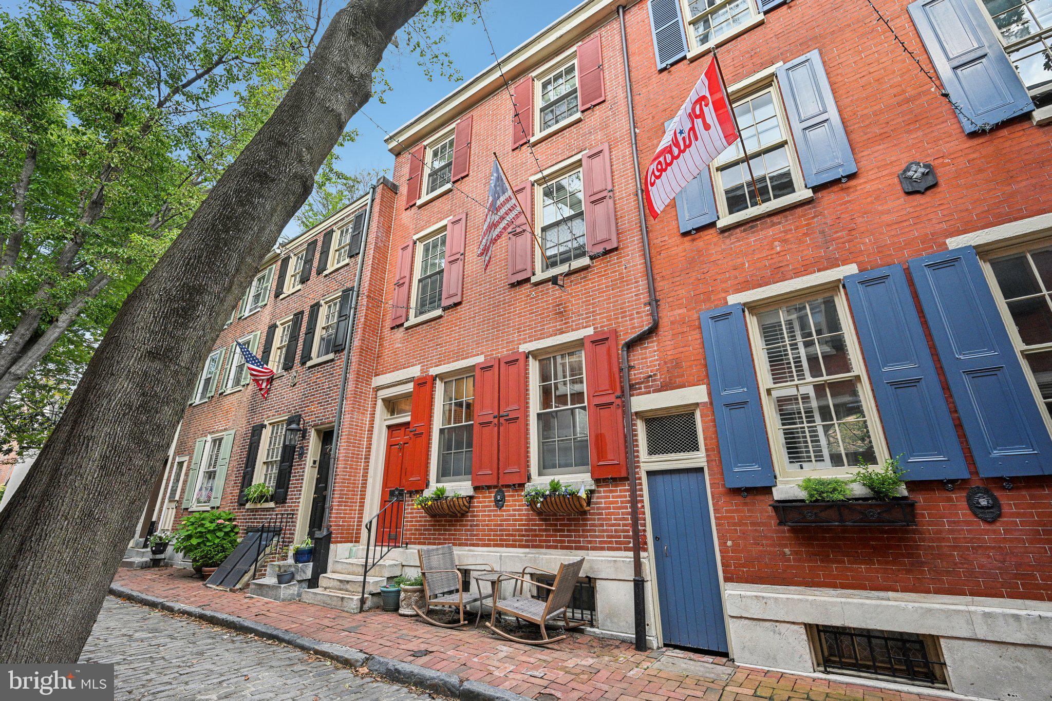 Enjoy significant light and space in this certified historic Greek Revival home (c.1847) on one of Society Hill’s most desirable, quiet, cobblestone blocks. This 2 bedroom, 2 bath home with finished lower level, a large rear patio, and a private 3rd floor walk-out deck, also features an open 1st floor plan that offers an open, renovated kitchen with upscale stainless steel appliances, including four door Samsung refrigerator, Bosch dishwasher, and GE oven/range and microwave, granite countertops and automatic blinds. The first floor also features hardwood floors; high ceilings; and a decorative fireplace. The 2nd floor has a large bedroom with Murphy Bed, excellent closet space, and an updated full bath. The 3rd floor offers the spacious and dynamic full-floor primary suite with vaulted ceilings, wood-burning fireplace, and full bath with glass stall shower. Also featuring a private deck with sliding glass doors. The home offers a modern staircase—much wider and more comfortable than the original. Superb storage throughout. Brand new central AC (May 2025). This sunny home offers the perfect blend of charm and character mixed with modern elements, in an ideal location.
Just blocks from all the best restaurants, coffee shops, entertainment, and shopping of Society Hill, Old City, Penn's Landing, and all that Center City has to offer. 2 blocks from the superb Head House Square Farmers Market. In the McCall School Catchment. On the Philadelphia Historic Register. 94 WalkScore and just 2 blocks from available Garage Parking.