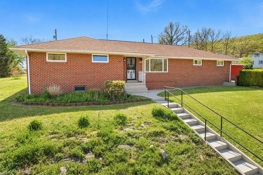 Welcome to the Potomac Park Charmer--

Set on a corner lot with a classic brick exterior, this 3-bedroom, 1.5-bath home carries the kind of character that doesn’t try too hard; it just is. The original finishes offer a sense of authenticity you can feel the moment you walk in, with clean lines, a practical layout, and the kind of craftsmanship that has quietly stood the test of time.

Natural light moves comfortably from room to room for the connected living spaces in the kitchen, dining, and living rooms. The single-level design keeps everything grounded and accessible with laundry upstairs or down, wherever you prefer. The spaces feel intentional; wasted, nothing overdone, just a home that works the way it was meant to. 

Outside, the partially fenced yard opens things up in a way that feels both spacious and connected. There’s room to garden, room to gather, or room to enjoy the mountaintop view. The setting offers that familiar neighborhood rhythm, where things feel steady and lived-in, not rushed.

This isn’t a home chasing trends or trying to be something it’s not. It’s one that has held onto its roots, offering a rare opportunity to appreciate what’s already here while imagining what comes next. Whether you lean into its vintage charm or choose to make it your own over time, the foundation is already in place.

Contact and agent to schedule your exclusive showing today!