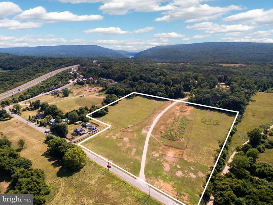 Opportunity to own a PRIME piece of real estate in Harper's Ferry, West Va. FLEXIBLE ZONING allows Residential, Light Industrial or Commercial use. This SCENIC LOCATION would be ideal for Apartments w/ good employment centers. MARC Train nearby, just 30 miles to DULLES airport. Enjoy the C & O Canal Toe Path, APPALACHIAN TRAIL, Potomac & Shenandoah RIVERS. Traffic signal at Rt. 340 intersection.