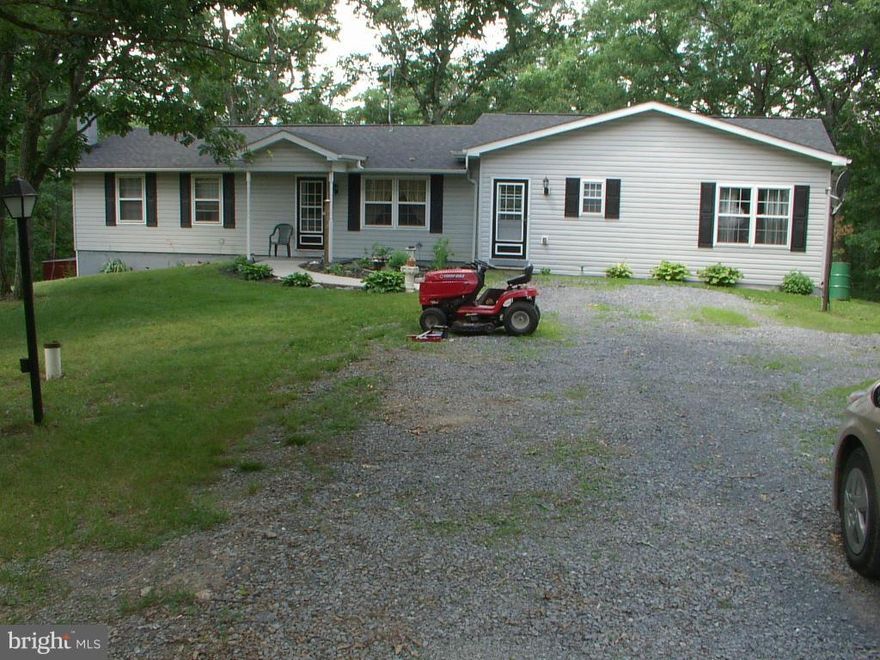 Lots of wildlife here. 8 secluded acres. Plenty of privacy and seclusion.  2188 finished sq ft. home.  New heat pump.  3 out buildings.  Big new addition and rehab, including roof,  just a few years ago,  5 miles from Walmart and hospital. Don't let the little dog out.