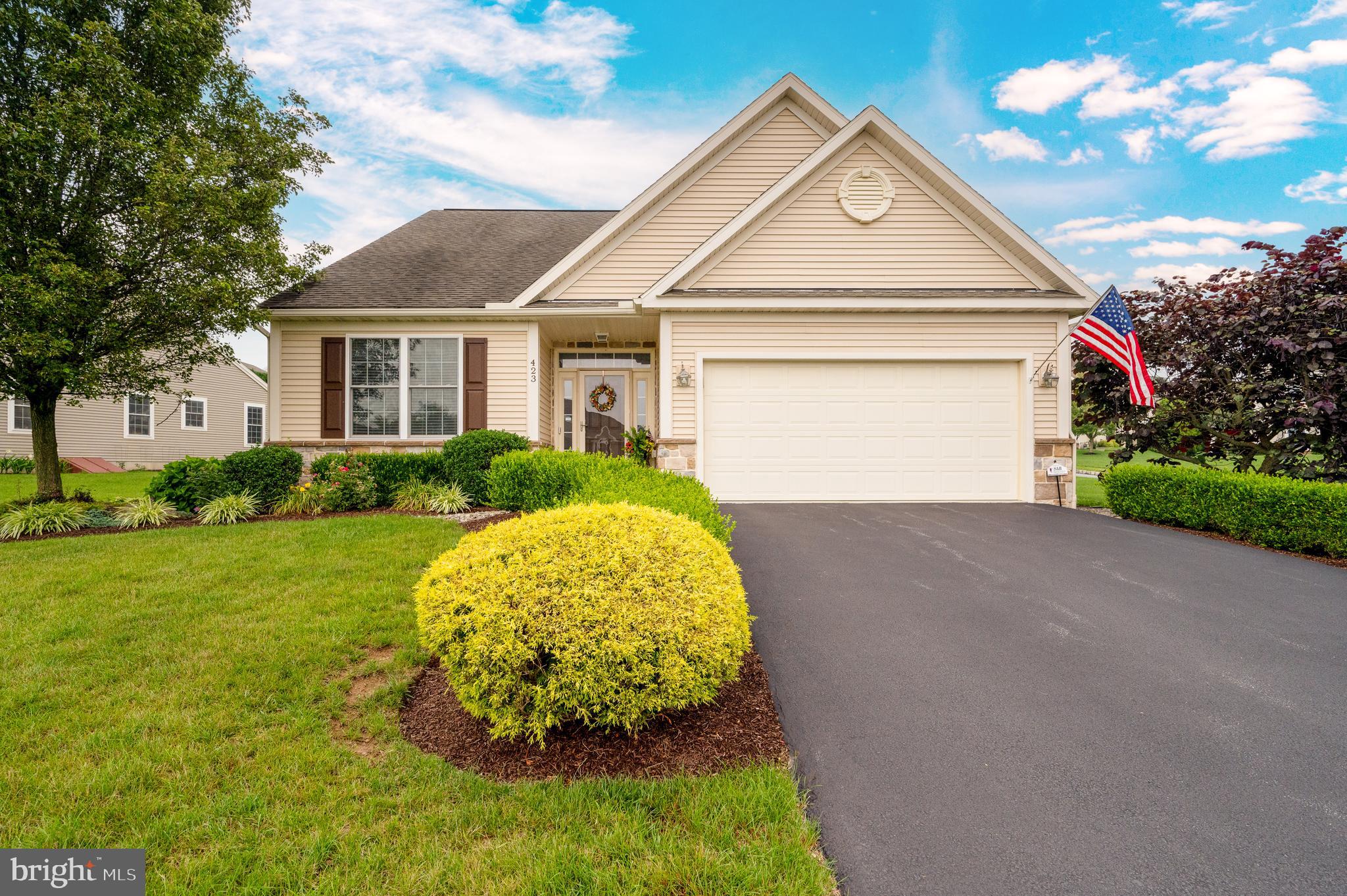 Welcome to 423 Springmont Drive, a charming residence nestled in the desirable community of Rosemont in the Wilson School District. This meticulously maintained property offers a comfortable and inviting atmosphere, and is ready for its new owners. As you step inside, you'll find a thoughtfully designed interior that balances functionality with style. The main level showcases a bright and open living room, ideal for entertaining guests or enjoying quiet evenings. The adjacent kitchen is a chef's delight, boasting modern appliances, ample cabinetry, and a convenient layout that makes meal preparation a breeze. This home offers three generously sized bedrooms. The primary bedroom includes an en-suite bathroom with a walk in closet. The additional bedroom on the main level can also be used as an office space. The upper level bedroom is  very private and spacious with its own private bathroom as well which is perfect for any visiting guests.   Outside, the backyard is a true oasis with an awning providing plenty of shade to enjoy the beautifully done paver patio. Other features to this home include a two car garage, a full basement with plenty of potential, and first floor laundry. Do not miss your opportunity to see this beautiful home and schedule your showing today!