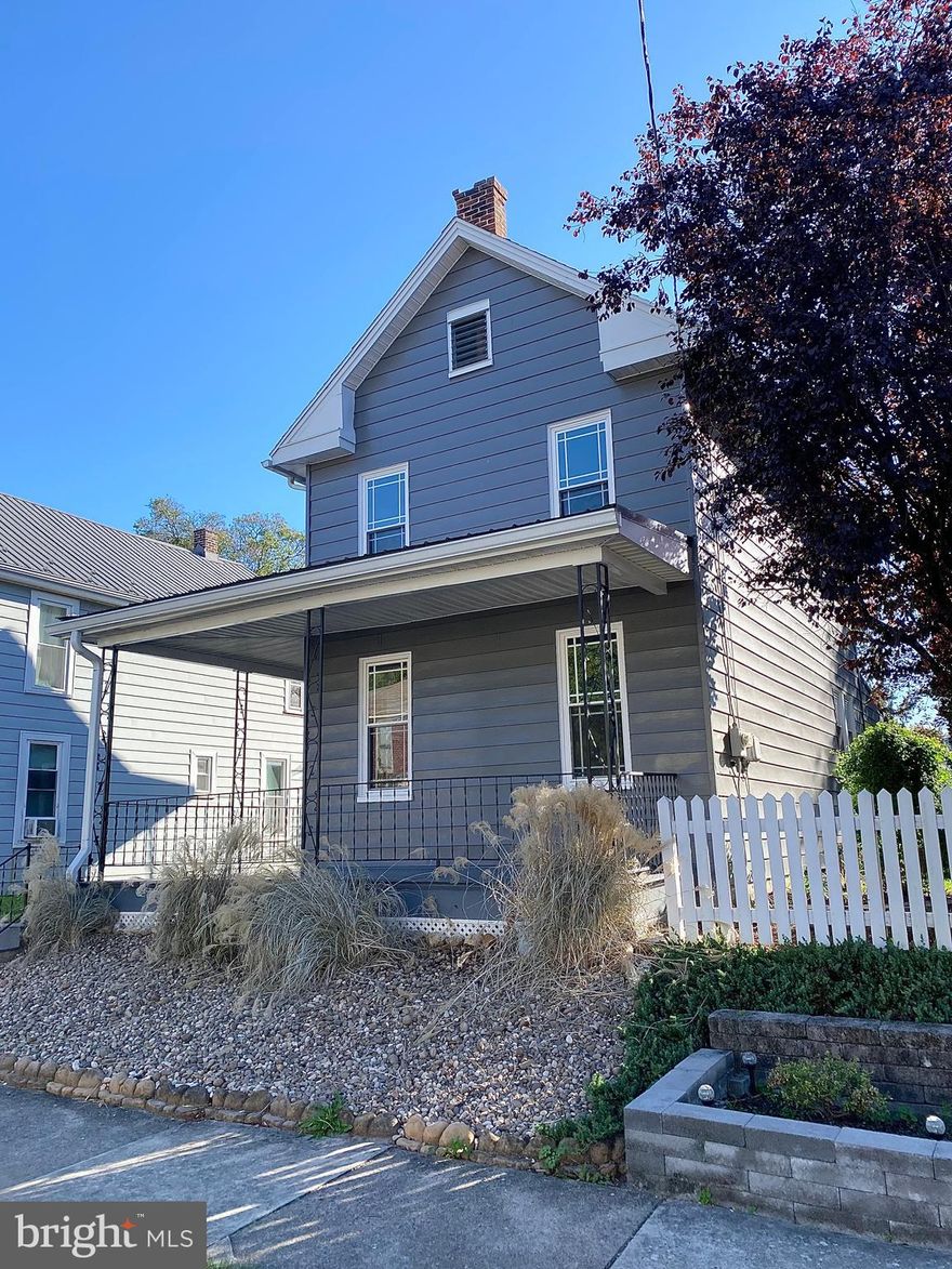 GORGEOUS UPDATED KITCHEN! This 4 bedroom 1.5 bath Colonial features: beautiful kitchen with modern white cabinets, granite counters, subway tile backsplash, & coffee station; first floor bedroom/office/den with half bath and laundry closet; master bedroom with balcony; updated full bath with granite top vanity; two additional upper level bedrooms; LVP floors; brand-new carpet; full attic with fixed stairs; replacement windows with nice window pane detail; wrap-around front porch; large covered patio; detached over-sized 1 car garage; alley access with additional parking; and so much more.  Setting on a lovely landscaped lot with a great back yard in a convenient borough location close to the hospital.