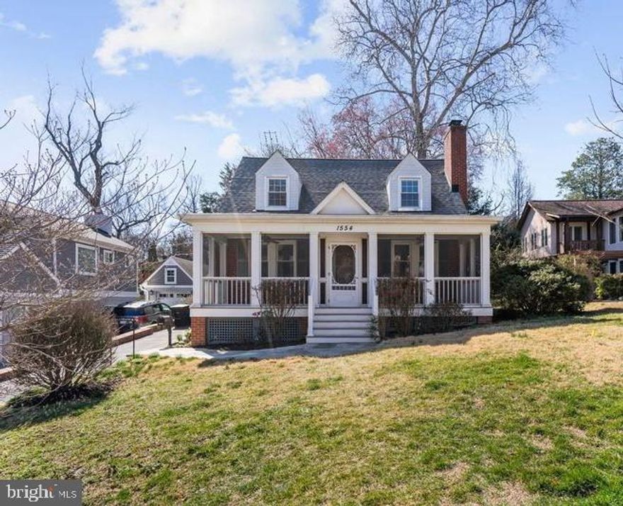 **Enter this classic cape cod through an inviting screened in porch with areas for casual dining and relaxing**The living room features a wood burning fireplaced flanked by built-ins and flows into the dining room** The kitchen has light wood cabinets, granite tops and a breakfast counter**A grilling patio is  off the kitchen**The main level bedroom has an updated en suite bath and doors opening to a private patio**Upstairs there is a very large primary bedroom and a second bedroom served by an updated bathroom**The basement has a cozy rec room and a large laundry area with a door opening to the driveway**Additional storage and areas for a gym and hobbies are available in the fresh clean basement**The home is located in Cardinal  Swanson Yorktown pyramid and is near the bike path, Westover Village for shops, restaurants, library, and Sunday farmer's market**Easy commute to Washington and  business, military, and government centers, National and Dulles airports and the  Tysons to Dulles tech corridor**