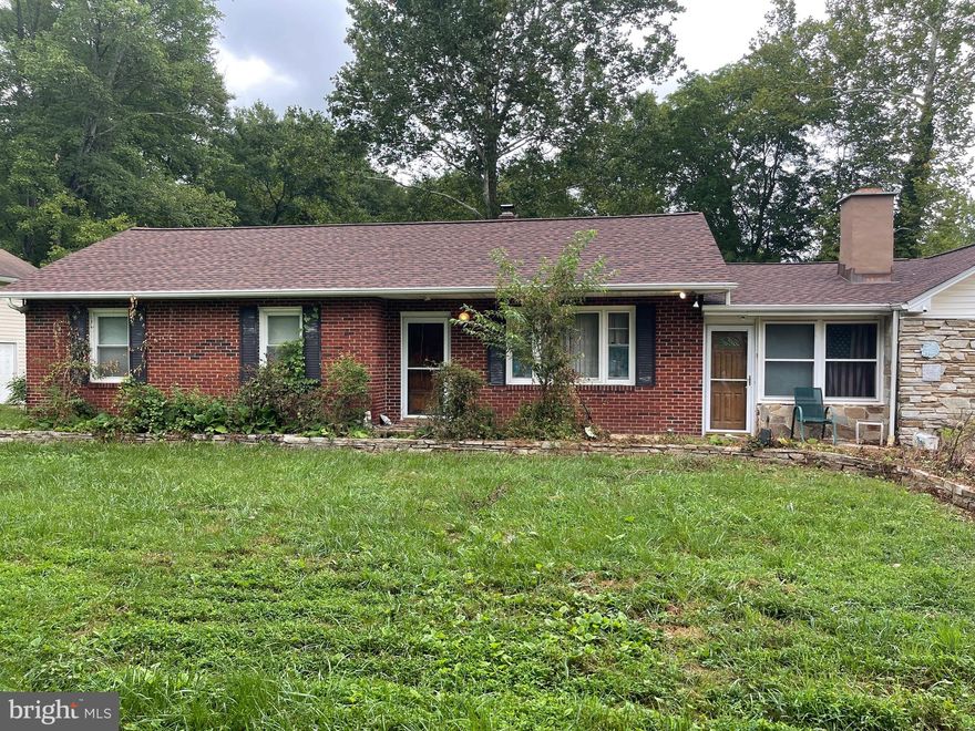 Mixed use zoning.   Zoning /use and potential flood insurance to be verified by buyer - Great opportunity for investment and rehab property - Square footage estimated. 
Property being sold as-is - In need of repair and improvements - Will not be cleaned out - Enter at own risk.