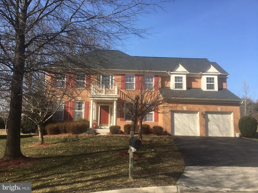 Due to ice storm, no photos yesterday.  Will have up Tuesday!  Showings have begun. Welcome home to this beauty - quality-built by Stanley Martin.  The upgrade elevation with brick front, covered portico, hip roof and dormers is just the beginning.  Tucked into a quiet cul-de-sac with no thru traffic, this is a fantastic location.  Dramatic two-story entry foyer with gleaming hardwoods is flanked on one side by a generous private office and  a formal living and dining room on the other.  The kitchen is a chef's dream with tons of counter space, a five-burner gas cooktop with downdraft, 42-inch light cherry cabinetry and a fabulous pantry.  The adjacent morning room walks out to an oversized, at-grade deck for those family cookouts and all of your entertaining needs.  The family room is dramatic with soaring ceilings, tons of light and a fireplace.  The mud room leading to the garage has lots of room for storage and even a handy laundry tub. Upstairs, the master retreat is stunning with a tray ceiling,  huge walk-in closet and master bath with separate tub and shower and dual sinks.  The oversized hallway features a dramatic overlook to the family room below. Three additional bedrooms have generous closet space, soaring ceilings and active dormers.  The hall bath is nicely laid out and has dual sinks.  The lower level is unfinished, has a full-bath rough-in and is the expanse of the whole home and awaits your creative touches.  The beautiful yard is so private and includes two flowering crabapple trees and a dwarf peach tree in the back yard.  Lots of other beautiful perennial landscaping included as well.  All so conveniently located in the Bridle Ridge community with easy access to shopping and dining and Harris Teeter, Starbucks, Social House, Ciros and nearby Fair Oaks Mall.  Dulles Airport is nearby and all the major commuter routes.  The community is just minutes to Dulles South Recreation and Community Center offering optional membership for kids and adults!  Welcome home to this beauty!