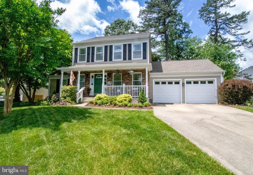 This Beautiful updated colonial is nestled In the amenity rich & desirable Severna Park community of Stewarts Landing. It has been Meticulously maintained by it's Owners and offers the perfect blend of classic yet comfortable design. The home features three bedrooms & two and a half baths, a finished basement & two car oversized garage. It’s wonderfully appointed on one of the largest corner lots in the neighborhood. The very recent updates are Abundant to include: Architectural 50 year roof (2022), top rated wide gutter guards, Insulated high energy efficient siding, Thompson Creek windows, skylights, back slider, all solid hardwood floors all the way through main level, oversized custom kitchen, recessed lighting and so much more… Upon arrival you will be greeted by the beautiful landscaped yard and covered front porch for those lazy peaceful nights. Step inside to discover a spacious and inviting interior bathed in tons of natural light. The heart of this home is the oversized Gourmet Custom Kitchen featuring ample solid maple cabinetry, granite, stainless appliances including a wine frig, gas range, pantry & inviting bar seating. The open layout seamlessly transitions into the dining room with fireplace/wood stove that heats the whole level & more. Walk out on your spacious no maintenance deck that backs to trees for lots of privacy creating a serene oasis for outdoor relaxation. Additionally, the main floor features a bright & open living room, half bath and a bonus den/office space perfect for your remote work. Upstairs you will find three bedrooms with a hallway full bath. The primary suite offers a walk-in closet and convenient laundry room on this level. The Finished basement provides additional living space and a bonus room with a closet perfect for a home gym or media room plus a utility room for your mechanicals & ample storage. The Community Amenities are over the top: The Marina offers boat slips, launch ramp & personal watercraft racks for easy storage. Two community play grounds & basketball court plus walking/jogging paths, sidewalks all around providing endless opportunities for waterfront recreation & exploration.