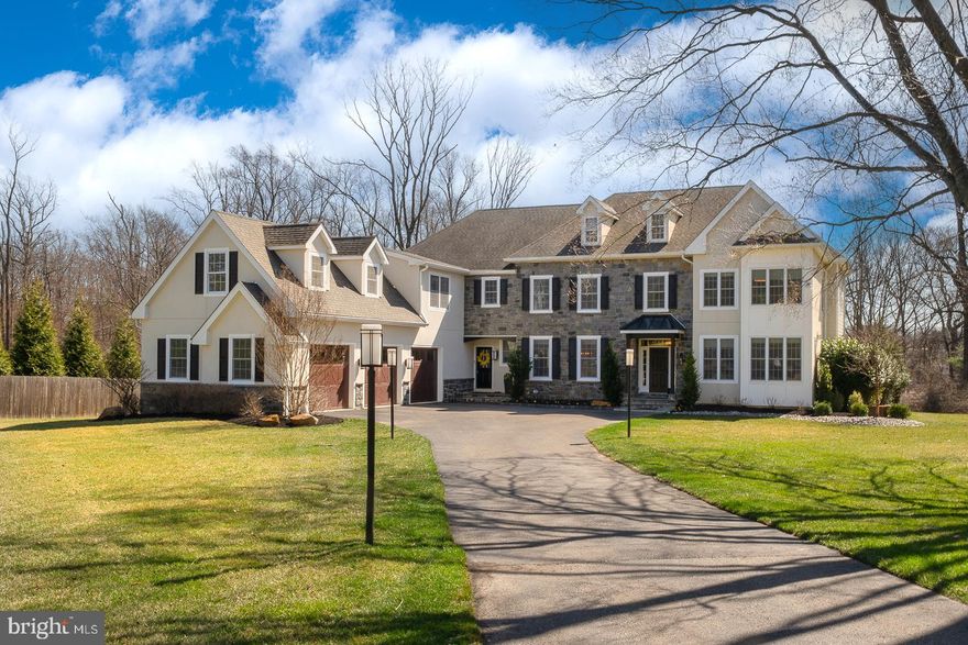 Elegant and expansive, this exquisite 5-bedroom, 4-full-bath, 2-powder room luxury home was thoughtfully crafted in 2018.  Offering 5,350 square feet of impeccable living space on 1.45 acres,  this home is a masterpiece of design and function.

The grand entry welcomes you into a formal living room with fireplace complemented by a sophisticated dining room with a custom butler’s pantry. Perfect for entertaining, the spacious gourmet kitchen features a large island, top-of-the-line appliances, and opens to a sun-filled breakfast room and a large family room with wood-burning fireplace.

Step outside to the expansive wraparound deck made of durable composite decking, ideal for enjoying serene outdoor living or hosting gatherings in complete privacy. A generous office space on the main level provides a quiet retreat for work or study, while the three-car garage and whole-house generator offer convenience and peace of mind.

Situated well back from the road, this home enjoys both seclusion and easy access to all the amenities you need, within the highly sought-after T/E School District.

Additional features include a luxurious master suite, four additional bedrooms plus 3 additional full baths on the second level.  Laundry room and a large bonus room complete the second level.

This property is an extraordinary opportunity to own a meticulously designed, nearly new home in a coveted location. Schedule your private tour today and experience the perfect blend of luxury and comfort.

*Some exterior photos were taken in October 2024 to highlight the fall foliage.