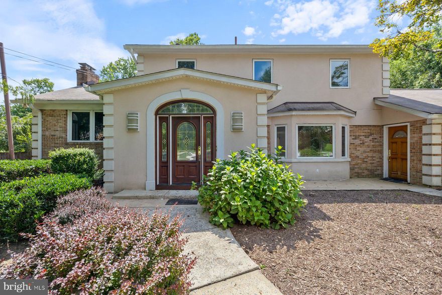 Incredible home! Expanded beautifully for family living. Entry foyer with spacious coat closet; Living room with large bay window facing front; Dining room off of the living room is spacious enough for large crowds; Powder room off of foyer with custom hand done painting; Kitchen is greatly expanded and has two sinks, two dishwashers, double oven, 5 burner cook top with pot filler, enormous cabinets custom made by Watkins Cabinets which are solid maple wood; Kitchen opens to very large family room/sunroom area with three sliding glass doors and skylights, exiting out to the deck and backyard; large laundry room off has space for two extra refrigerators or freezers, and has a coat closet. From the laundry room, you enter an office area with two rooms that were used as a library and an office. The large office has a door that exits to the front of the house and has a walkway for visitors. Through the kitchen is a hallway going to the master suite: there is a sitting room that has sliding glass doors to the deck; there are two walk in closets. The master bathroom has a large jetted soaking tub and a walk in shower, separate room for the toilet and two separate vanities with sinks.. The master bedroom is extremely large and has a large bay window looking out to the backyard. From the foyer, three steps lead to the elevated family room with wood burning fireplace. there are steps down in the rear to the kitchen area and to the hallway leading to the master suite. From this family room, steps go up to the second floor. There are four bedrooms all with very large closets. there are two hall bathrooms and linen closets., and an extra sink and vanity across from the larger linen closet. From one of the bedrooms, there are stairs leading up to the unfinished attic. From the foyer, stairs lead down to a lower level room with fireplace that can be a playroom. There are built-in shelves and cabinets for storage along one of the walls, and a second fireplace. From this room there are three steps down to another finished room on the basement level. Beyond that room, there is a hall to a half bathroom and a storage room with a worktable. Through that room, there is another room with two closets. This room has a staircase that goes up to the area leading to the library and office. Off of this second room is another storage room. THERE ARE FOUR ZONES AND FOUR HEAT AND AIR CONDITIONING SYSTEMS.  All offers should be emailed and will be presented as they come in. Please include lender assurance or cash to close.