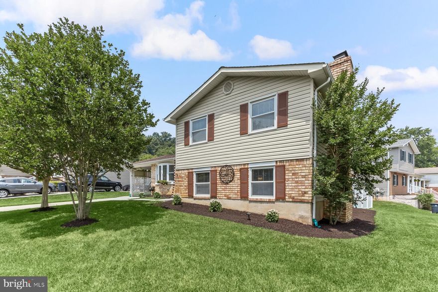 Gorgeous home alert! This is the one you have been waiting for! Charming and meticulously well-maintained, this home is located in the highly desirable Montpelier community. Caring homeowners have upgraded this home and you can move right in without having to do any projects. This home boasts upgrades galore and is located on a premium corner lot that is fully fenced in and offers unlimited potential for indoor and outdoor entertaining, and relaxing at home! Enter into a light-filled level with a spacious and welcoming foyer that leads to a living room, a dining room, and a gorgeous eat-in kitchen. The dining space opens to a private and fabulous backyard with a patio and a Trex deck. There is a large shed for storage or a hobby area. The kitchen features ample storage space in updated cabinetry and stainless steel appliances and it has space for seating. The bay window has been home to thriving plants basking in the sun. On the upper level, you will find four spacious bedrooms and two full baths. The primary suite has a large closet and an attached primary bathroom. The family room is inviting and offers endless hours of relaxation and is complete with a cozy fireplace. There is an additional bedroom and a half bath as well as a utility/laundry/storage room that is walk-out level. The laundry room features a new luxury vinyl floor and has a custom built-in laundry area that makes it a breeze. The unfinished basement offers an opportunity to customize according to the new owner's needs. There is a carport and a large driveway. Upgrades include an updated kitchen, baths, new roof, replaced all insulation, landscaping, new HVAC/Furnace unit, new deck, patio, shed, new hot water heater, and fence. The Greater Montpelier community area is vibrant and offers a ton of options including a swimming pool, a swim team, a baseball field, tennis and basketball courts, local parks and trails,  community events - Holiday Decorations and Lights contest, Fall Festival, Annual 5K Walk and Run, and many more events throughout the year. This home is spacious, has a large yard, and is conveniently located close to Ft. Meade, NSA, NASA, the USDA, as well as, 95, 295, 200, and other commuter routes.