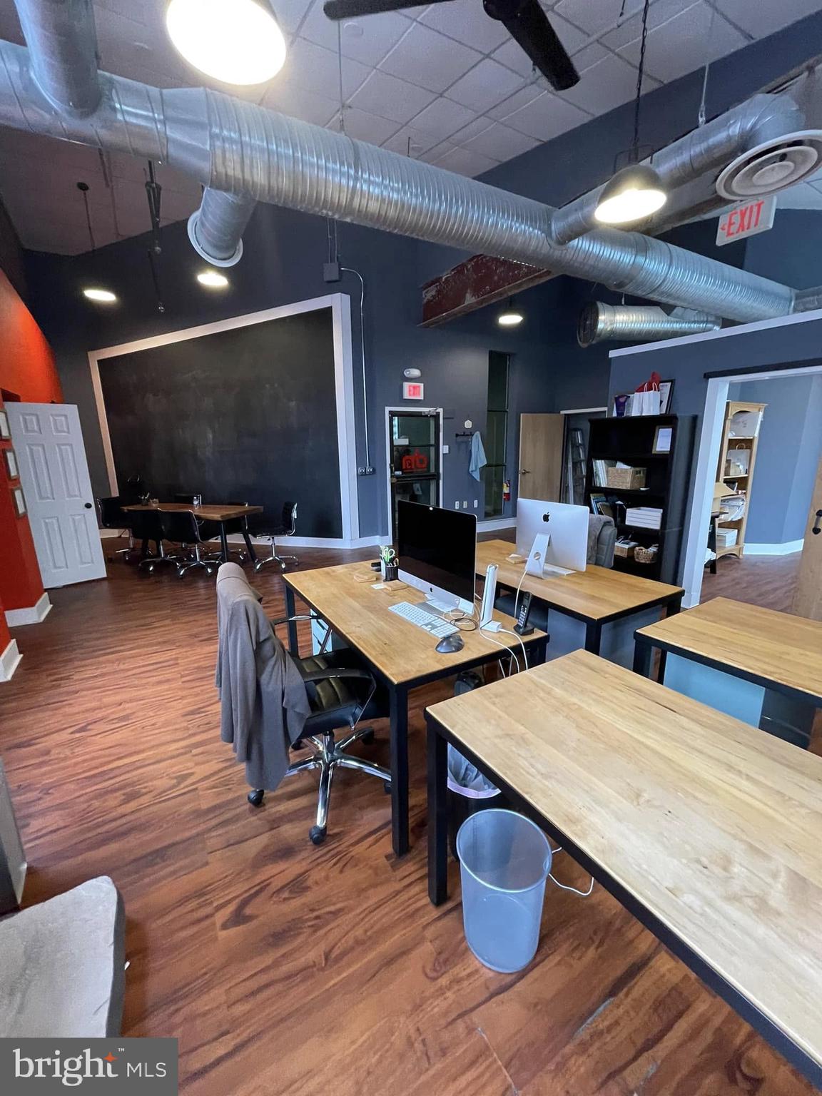 Condo for LEASE Suite 204A - 973 SF @ $21 SF - contains a Conference / Office Room, Large Open Area, and Large Kitchen Area.