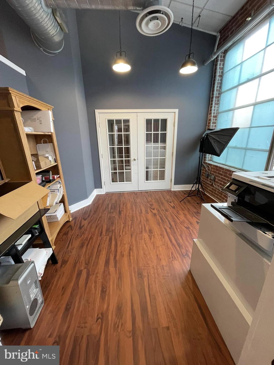 Condo for LEASE Suite 204A - 973 SF @ $21 SF - contains a Conference / Office Room, Large Open Area, and Large Kitchen Area.