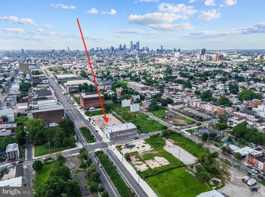 MQA is pleased to exclusively present 2414-38 N American St. & 2440-46 N American St. FANTASTIC DEVELOPMENT SITE in the growing North American Street Corridor. The property sits within multiple incentive zones including QUALIFIED OPPORTUNITY ZONE and the City of Philadelphia’s American Street Empowerment Zone (ASEZ). The property holds a valid and active license to operate as a warehouse or an artist studio. Other possible uses public storage, car wash, research and development, amongst other light Industrial. 100% ALLOWABLE LOT COVERAGE. These two separately deeded parcels are being sold together as a package. The property consists of a two-story corner warehouse and a spacious vacant lot. Currently, the warehouse is generating $60,900 in annual rental earnings from five existing tenants. For enhanced security, the building is equipped with an alarm system and state of the art fire suppression system. 2414-38 N American St. & 2440-46 N American St. has a total lot size of both parcels is 33,275 SQ FT. Rapidly expanding West Kensington. Just moments to MFL Frankford TC to 69th St TC at the York Dauphin Station - MFL stop.  Nearby parks include Fairhill Square, Fotterall Square, and Palmer Park. Drive by and make an offer!!!