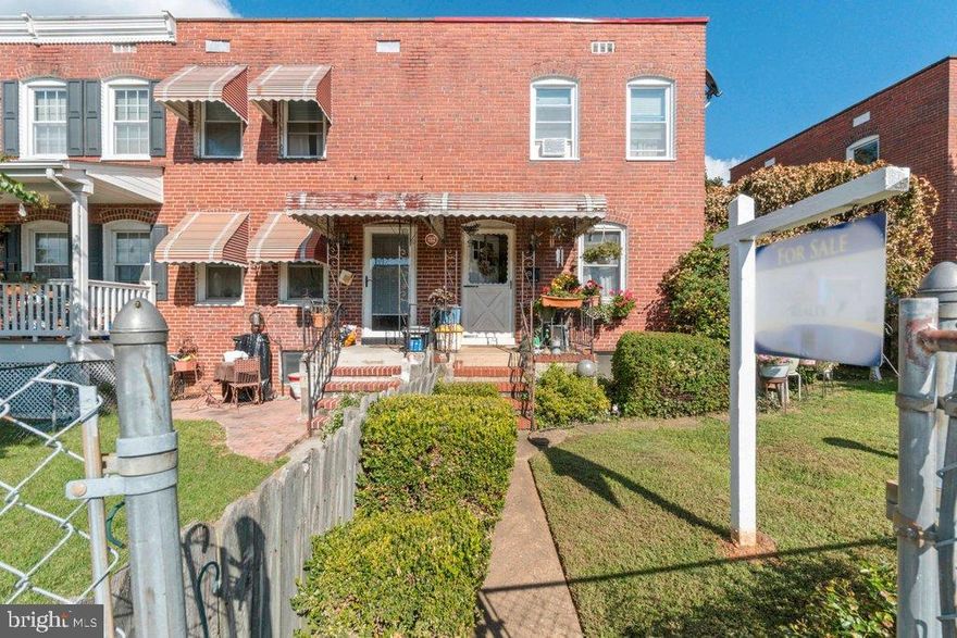 Cute end of group rowhome.  2 beds and 1 bath.  Addition on the back makes it bigger than other 2 bedroom houses in the neighborhood.  Partially finished basement.  Fenced yard and nice deck.  Parking out back with enough room for at least 2 cars. Newer roof.  Instead of houses behind the house, there's field.  Very private.  Come see it now.