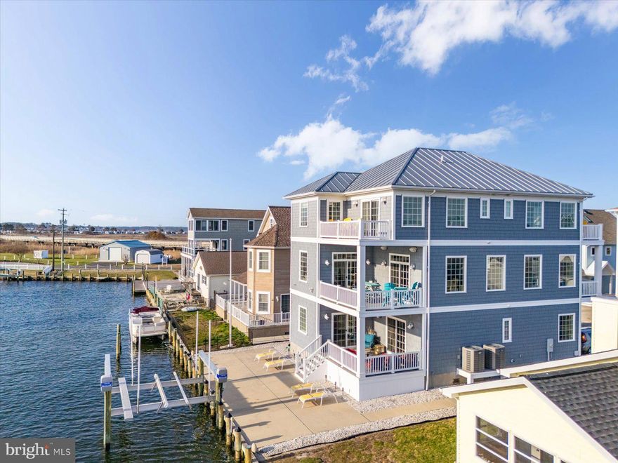 Located in the private community of Cape Windsor, residents enjoy amenities including a community pool, boat ramp, and easy access to the bay, all just minutes to Fenwick Island beaches and Ocean City attractions.
This is a rare opportunity to own a large waterfront home in one of the area's most desirable coastal communities—perfect as a primary residence or a vacation getaway, Experience the ultimate in coastal living in this expansive waterfront home offering 6 spacious bedrooms and 6.5 baths, perfectly designed for comfort, entertaining, and multi-generational living. Ideally situated on a prime bulkheaded lot, this residence provides direct water access to the bay—perfect for boating, crabbing, and enjoying life on the water. Step inside to discover a light-filled open floor plan with generous living spaces, multiple ensuite bedrooms, and thoughtfully designed interiors that blend coastal charm with modern convenience. The home offers 6 bedrooms and 6.5 bathrooms providing ample room for guests, with private retreats on every level. large family room with open kitchen. Home comes  furnished , has elevator and 2 laundry rooms for your convenience . Outdoor living is just as impressive—enjoy waterfront views, relaxing breezes, and endless sunsets from expansive decks and outdoor entertaining areas. Plenty of space for docking your boat and embracing the coastal lifestyle. An excellent opportunity as a luxury vacation home,  or primary residence—this property offers versatility, space, and the best of coastal living.
Public Open Hose Friday 4/3 1:00-3:00. Saturday 4/4 10:00-2:00pm