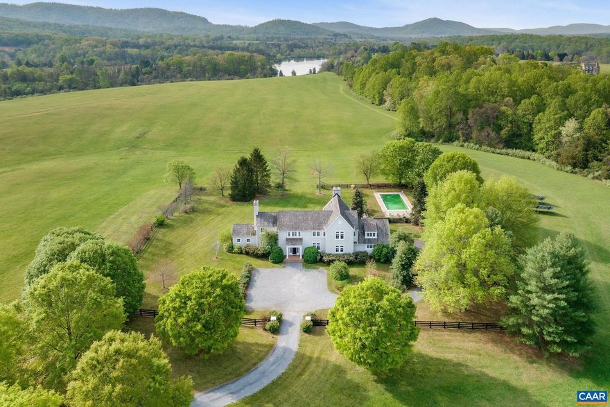 Enchanting 42 acre estate nestled amongst long rolling pastures, accented by breathtaking mountain views & a rich rural character, in truly one of the most picturesque communities in all of Central Virginia, Blandemar Farm Estates - yet only 10 miles to the City of Charlottesville & UVA. Stunning 5 bedroom, 3.5 bath stucco residence has over 4,500 finished sq.ft. of comfortable living space throughout 2 levels, and is built with top quality materials & craftsmanship. The main level is highlighted by a lovely flowing floor plan w/ spacious natural light filled rooms, artful finishes, gorgeous hardwood floors, three wood burning fireplaces, and access to a covered rear patio, perfect for relaxation, entertaining & more. The second level hosts the primary suite w/ large walk-in closet, 3 bedrooms w/ new carpet, plus a bonus room with a multitude of uses. The property is beautifully landscaped, and also features a private pool. Made up of two 21 acre parcels, which is rare in this neighborhood, and also backing up to a shared pond, it's hard to imagine a more perfect setting!,Formica Counter,Painted Cabinets,Wood Cabinets,Fireplace in Family Room,Fireplace in Living Room,Fireplace in Study/Library