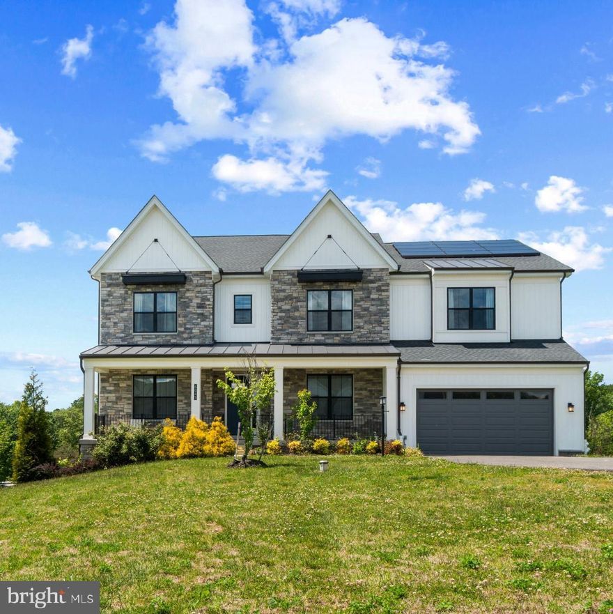 Welcome to 6045 — an exceptional luxury residence nestled on 1.12 private acres in the heart of the highly sought-after Dayton area, offering the perfect balance of elegance, comfort, privacy, and modern efficiency. This beautifully appointed four-year-old home presents a rare lifestyle opportunity in one of Howard County’s most desirable settings.

Thoughtfully designed for both everyday living and upscale entertaining, the home features expansive living spaces filled with abundant natural light, a stunning chef’s kitchen crafted for gathering and entertaining, and seamless indoor-outdoor flow throughout. The luxurious primary suite serves as a private retreat, complete with a spa-inspired bath featuring a soaking tub, dual vanities, and a spacious walk-in closet. Additional bedrooms offer en-suite bathrooms, providing comfort and privacy for family and guests alike.

Modern enhancements include solar panels that promote energy efficiency, reduce utility costs, and support long-term sustainability. The serene setting creates a true retreat atmosphere while remaining conveniently located near major commuter routes to both Baltimore and Washington, D.C.

Ideally situated close to the Triadelphia Reservoir and surrounding recreational areas, residents can enjoy scenic trails, kayaking, fishing, and outdoor leisure just minutes from home. Set within a premier school district and surrounded by mature landscaping, this exceptional property combines timeless sophistication, modern amenities, privacy, and enduring value — ideal for elevated everyday living.