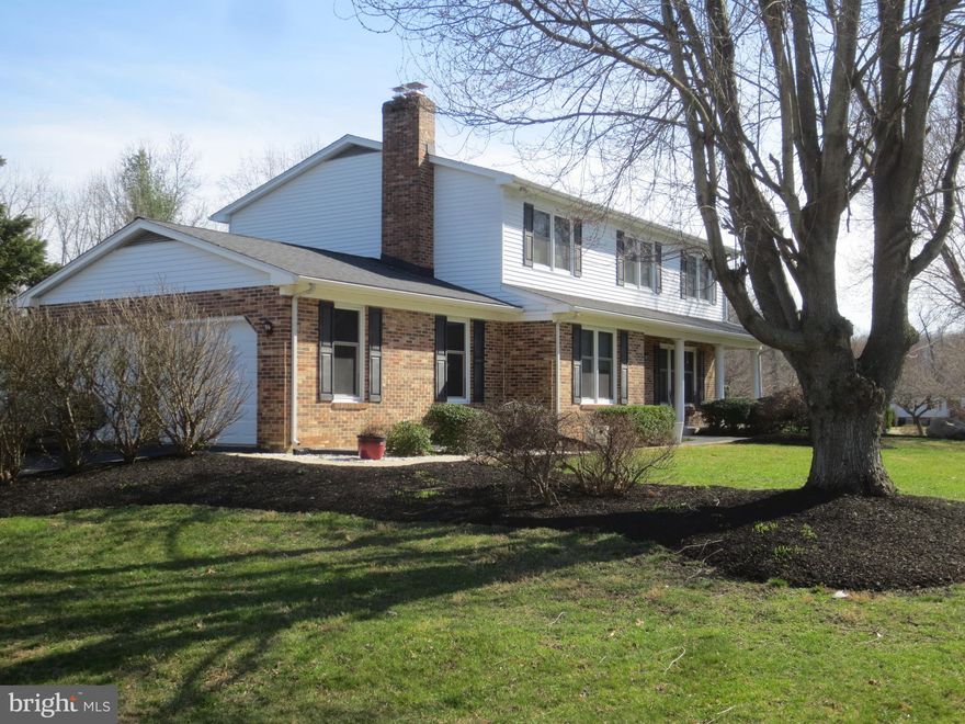 This is an Extremely well-maintained traditional colonial, which is rarely available in Hickory Woods. Open the door to a trademark RC Peoples slate entry hall and find lovely refinished oak flooring throughout the first level. Go right; Through the living room, then a formal dining room off one side of a well-appointed kitchen with loads of nicely done cabinetry, granite countertops, brand new stove and plenty of light. Through the kitchen and you are in a large, bright, built for comfort, family room.
Upstairs, the flooring is also oak though the bedrooms are carpeted for barefootin' comfort, and all four bedrooms are sized to accommodate a larger family.
Down to the basement, which is 90% finished, you will find plenty of light, a wet bar, pool table, a bath w/shower, an Eliminator fan which pulls stale air out and fresh air in, a wall set TV, some large lounging furniture, and discretely set behind the finished walls are the mechanical operations of the home. What's New?  The roof from 2017 with a 50-year warranty, A/C unit from 2021, forced air heater,2022, energy efficient windows from 2022 with transferrable warranty, pool liner, 2020, pool filter 2022, and from January '26; Garage doors, door openers, fire door, screened porch. porch doors, pool cover, front and back doors, French doors, and the front porch and front walk levels have been reset (15-year warranty)
Sellers have had an exterminator visit every six months since 2005. All in all, you will just have to enjoy and appreciate this delightful home.