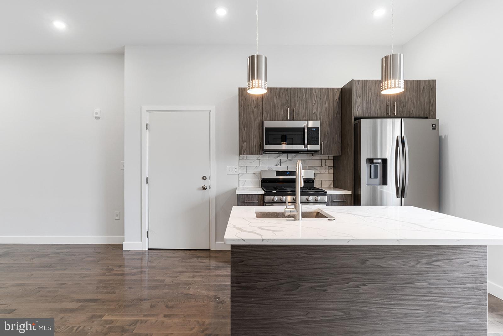 Are you a hungry investor? Perhaps an owner-occupant looking to house hack? Now's your chance to purchase a turn-key, income-producing asset nearby Temple University with projected rental growth. From toasted oak hardwood flooring and contemporary kitchens to central air and open concepts, each unit offers desirability for owners and renters alike. The unit mix includes four (4) 2 bedroom, 2.5 bathroom bi-level units equipped with in-unit laundry with option of private outdoor space. The property is also located within a Qualified Opportunity Zone, providing potential tax advantages for investors, and includes approximately six years remaining on a tax abatement. Walking distance to Temple University, Cousin's Supermarket, Human Robot Beer, Luna Cafe, the Broad Street Line. Easy access to all the happenings in Fishtown, Broad St/611, and Girard Ave. Owner-occupants have the option of putting 5% down on a conventional loan. Message for more info (and tour today)!