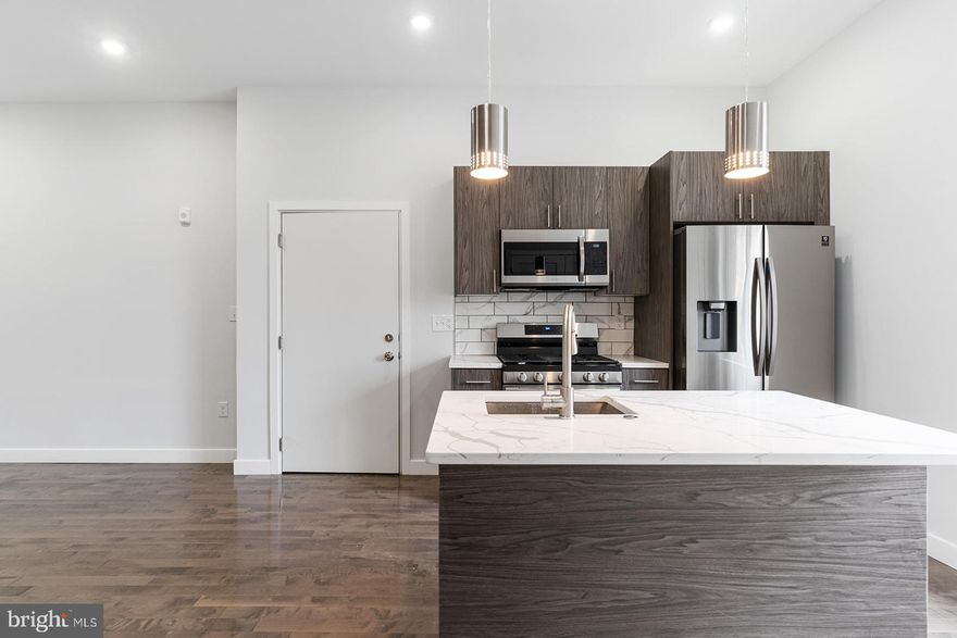 Are you a hungry investor? Perhaps an owner-occupant looking to house hack? Now's your chance to purchase a turn-key, income-producing asset nearby Temple University with projected rental growth. From toasted oak hardwood flooring and contemporary kitchens to central air and open concepts, each unit offers desirability for owners and renters alike. The unit mix includes four (4) 2 bedroom, 2.5 bathroom bi-level units equipped with in-unit laundry with option of private outdoor space. The property is also located within a Qualified Opportunity Zone, providing potential tax advantages for investors, and includes approximately six years remaining on a tax abatement. Walking distance to Temple University, Cousin's Supermarket, Human Robot Beer, Luna Cafe, the Broad Street Line. Easy access to all the happenings in Fishtown, Broad St/611, and Girard Ave. Owner-occupants have the option of putting 5% down on a conventional loan. Message for more info (and tour today)!
