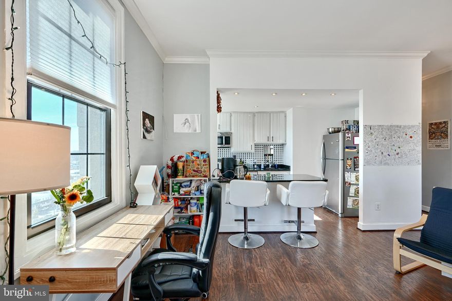 Experience the perfect blend of historic charm and modern comfort in this charming 2-bedroom, 2-bathroom condo in The Belvedere, one of Mount Vernon’s most iconic buildings.  This property features beautiful flooring, high ceilings, and breathtaking city skyline views through expansive windows, filling the unit with natural light. The kitchen is designed for both functionality and charm, making it a joy to cook and entertain. The two bedrooms are generously sized, offering comfort and privacy, each with their own bathroom. Located in the heart of Mount Vernon, this home offers unparalleled access to the city's best restaurants, attractions, and nightlife. Don’t miss the opportunity to own a piece of Baltimore history with unmatched views—schedule your tour today!