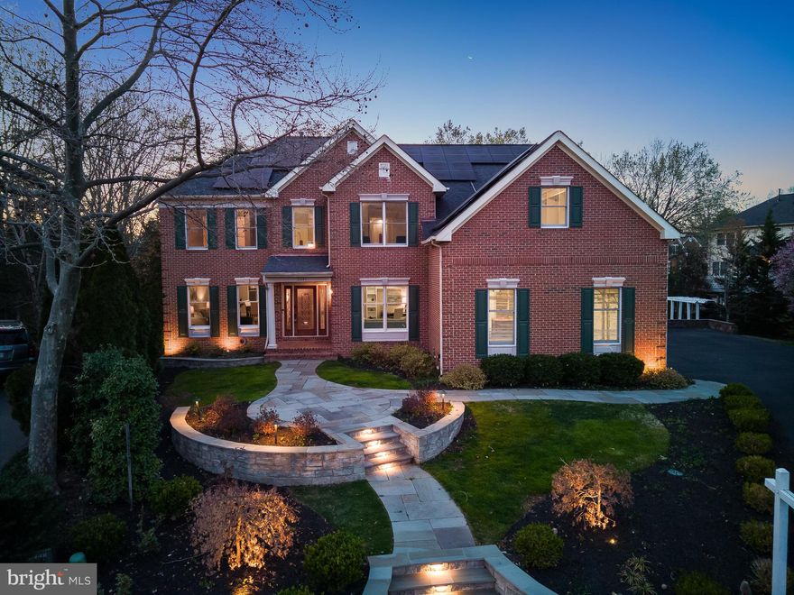 Welcome home to 26149 Sealock Lane – Nestled in the coveted South Riding neighborhood of Chantilly, this exquisite 5,300+ SQFT home offers the perfect blend of modern updates and timeless elegance. Situated on a premiere lot, this property provides unmatched privacy and space, making it an ideal retreat for those seeking luxury and comfort. The main level of the home features a grand 2-story foyer, a formal living room and dining room, and an office. The heart of the home is a complete open-concept space with a chef’s kitchen that opens to a breakfast room, a finished sun-room, a 2-story great room, and the 4-season porch! The recently updated kitchen has custom cabinetry, an exotic granite countertop, and top-of-the line Miele appliances (including a built-in coffee machine)! This level is complete with a pantry/laundry room and access to the oversized 3-car garage with a prep kitchen! Two separate grand staircases lead to the upper level, which hosts the primary suite—complete with a walk-in closet and newly renovated bathroom with a zero-entry shower, dual vanities, and a beautiful free-standing tub! This level also has 3 additional bedrooms and a renovated guest bath. The walk-out lower level is the perfect space for entertaining, with a media room, full kitchenette, large rec room, and another full bath. There is also access to the patio, deck and screened-in porch from this level! This home sits on a premiere lot, providing both exceptional curb appeal and a private, spacious backyard perfect for outdoor activities and gatherings. Additional updates include a newer roof,  built-in speaker system, exterior uplighting and an irrigation system, and owned SOLAR PANELS!!! Located in the highly sought-after/amenity rich South Riding community, this home is just minutes away from top-rated schools, in community parks, sports courts, pools, sports fields, and abundant shopping and dining options! With easy access to major highways and Dulles Airport, you’ll have everything you need within reach. Don't miss the opportunity to make this stunning property your forever home. Schedule a private tour today and experience the luxury and comfort this home offers firsthand!