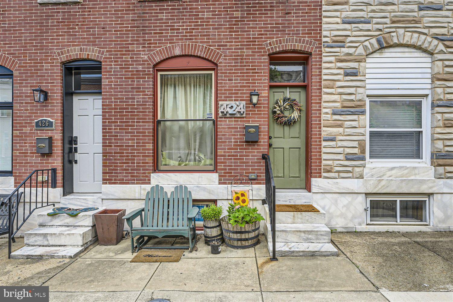 OFFERS RECEIVED. PLEASE SUBMIT BEST AND FINAL BY MONDAY, JULY 17, 2023 7PM.
Immerse yourself in the beauty of this Highlandtown gem—a stunning brick townhome offering 3 bedrooms and 2 bathrooms. Step inside the remodeled dwelling and be welcomed by a radiant living area adorned with hardwood floors and a stylish brick backsplash. Continue into the expansive open concept kitchen, featuring stainless steel appliances and elegant granite countertops. Journey upstairs to discover two generously sized bedrooms complemented by a full bathroom. Indulge in the extraordinary feature of the primary bedroom—a stunning walk-out rooftop deck that offers an idyllic setting for enchanting evening dinners, captivating sunset views, and memorable gatherings with cherished loved ones. This remarkable addition provides the perfect backdrop for creating unforgettable moments and embracing the joys of outdoor living. Descend to the lower level, which offers abundant closet space for storage, a convenient laundry area, an additional bedroom, and another full bathroom. This move-in ready townhome is conveniently located near shopping centers, restaurants, and commuter routes, ensuring a seamless and convenient lifestyle.