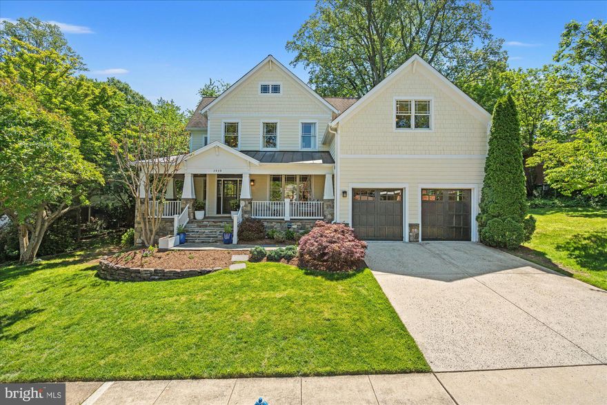 NEW LISTING! Open Saturday May 16th and Sunday May 17th from 2 - 4 PM both days! Built in 2007 and thoughtfully designed for modern living, this exceptional Arlington arts and crafts residence with built by Lane Homes combines timeless architecture with refined, high-end finishes throughout. Let the wide, wrap around front porch welcome you into the two-story foyer.  A front formal living room flows to the stunning dinner-party-ready dining room with beautiful wainscoting and custom wallpaper.  A main level office is quietly tucked away creating the perfect work from home environment and the brand-new main level half bathroom is ideal for owners and guests alike.  The recently refreshed kitchen offers incredible storage, excellent counterspace, chef-quality appliances including a six-burner Wolf range, new lighting and a deep pantry. A cozy bayed breakfast nook is adjacent to the main level family room with gas fireplace and access to the large rear deck.  Upstairs offers four spacious bedrooms and three full bathrooms including the expansive primary suite, which spans the full width of the house.  Featuring a king-sized bedroom area, a separate siting area, two walk-in closets and huge full bathroom with glass shower, soaking tub, dual vanities and separate water closet, it is a true owners’ retreat. The fully finished lower level is home to a large recreation room with separate bar area, the home’s fifth bedroom and fourth full bathroom, a large media room or gym space, a sauna room and an abundance of storage.  The attached oversized two car garage is connected to a convenient mud room and an upper-level laundry room adds everyday convenience. Additional recent updates include new paint, new lighting, fresh landscaping and more. Situated on an impressive 10,000 square foot lot, the property offers exceptional outdoor space rarely found in Arlington, with room for recreation, entertaining, and flat rear yard. Combining substantial scale, premium construction, and a sought-after location, this distinguished home presents an outstanding opportunity in one of Arlington’s most desirable communities and just one light to DC, major commuting routes, top-rated schools (currently zoned for Jamestown/Williamsburg/Yorktown) and more.