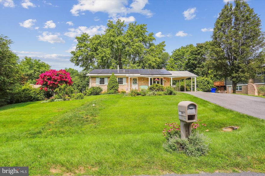 Welcome to this inviting rambler nestled in a quiet neighborhood. This meticulously maintained property boasts a comfortable layout and modern updates. Exterior features include a carport, a spacious and flat backyard, delightful patio, and a front porch perfect for relaxation. Siding and insulation replaced between 2008/10.  The home is equipped with solar panels, providing energy efficiency.   Step inside and discover that the house has been lovingly updated, including the all-new sewer and water lines completed in 2022, providing peace of mind for years to come. The thoughtful energy efficiency upgrades, including replacement double-pane windows 2017, extra attic insulation 2010, insulated siding 2008, roof replaced in 2012 w/ ridge vents, and soffit vents. The interior exudes a sense of warmth. The eat-in kitchen, basking in natural light through a bay window offers a bright and airy atmosphere for meal preparation and dining. Modern updates to the kitchen and bathrooms seamlessly blend with the house's classic charm, providing both functionality and style. Low utility bills are a testament to the solar panels installed in 2016, embracing green energy solutions. The home also features a one-year-old water heater. The spacious walk-out lower level extends your living space, featuring a large family/rec room, a 4th bedroom, a full bath, a laundry room, and separate storage room. This versatile level offers endless possibilities, whether it's for a guest suite, a home office, or an entertainment zone. Outside, the property flourishes with organic gardens adorned with fig and blueberry bushes, vibrant azaleas, native plants, and perennial blooms. The manicured landscaping not only adds to the curb appeal but also showcases your personal touch.  Convenience meets lifestyle with this property's strategic location. Enjoy easy access to the Shady Grove Metro, I-270, and the ICC, making commuting and travelling a breeze. Nearby shopping and dining options ensure that you're never far from entertainment and essentials. In summary, this charming rambler offers not only a comfortable living space but also a sense of community and serenity. From the energy efficiency upgrades to the beautifully landscaped grounds, every detail has been carefully curated to provide you with a delightful living experience. Don't miss the chance to make this exceptional property your new home.