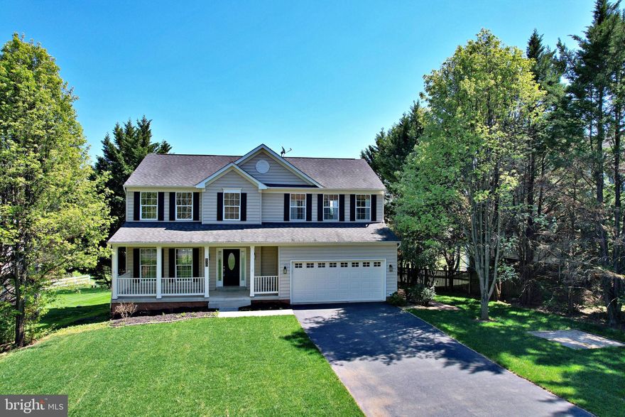 Experience refined golf course living in this stately 5-bedroom, 3.5-bath colonial nestled along Hole 13 of the prestigious Locust Hill Golf Community. Offering three finished levels of generous living space, this home blends comfort, sophistication, and scenic beauty.

The main level features elegant formal rooms, a well-appointed kitchen with an inviting center island, and a spacious family room anchored by a warm gas fireplace. The expansive rear deck provides sweeping views of the fairway, while farm fields across the street create a rare sense of privacy and tranquility.

Thoughtful updates include new luxury vinyl plank flooring, plush carpet, upgraded granite countertops and kitchen finishes, fresh interior paint, and more.

Conveniently located near top-rated schools, shopping, and commuter routes, this home offers the perfect balance of lifestyle, location, and luxury. Discover the exceptional living experience that awaits at Locust Hill.