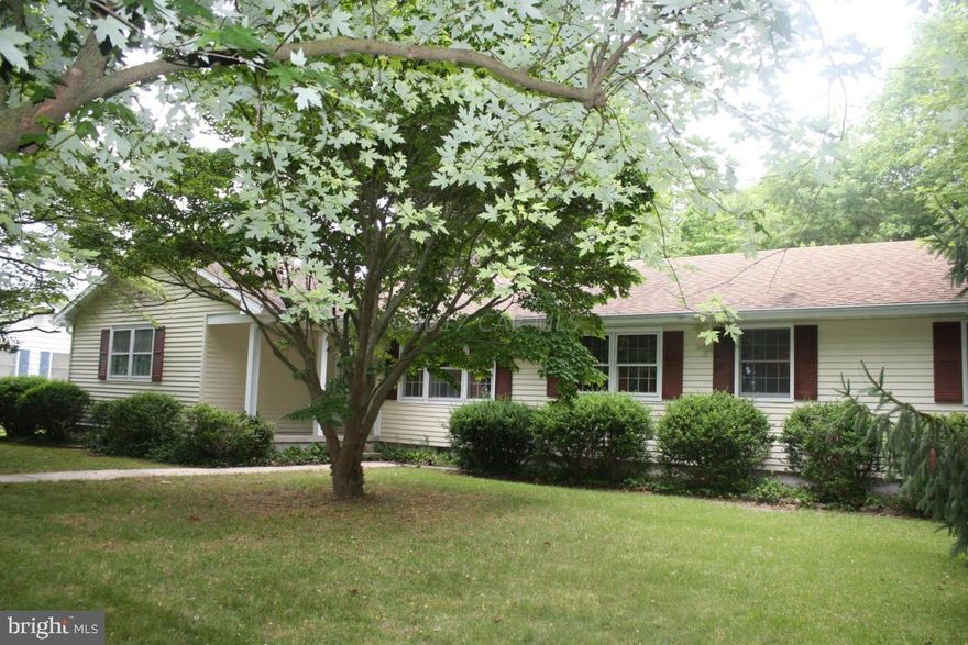 Here is a look back to the 70's,  Harvest Gold was the color of the day!.  In this delightful home located near sidewalks to Berlin you will find a sprawling home with great curb appeal.Bring your ideas & create your own sanctuary in the back yard.  There is a double car garage, concrete driveway, upgraded shingles, lightening rods, 2 sheds and charm all over!