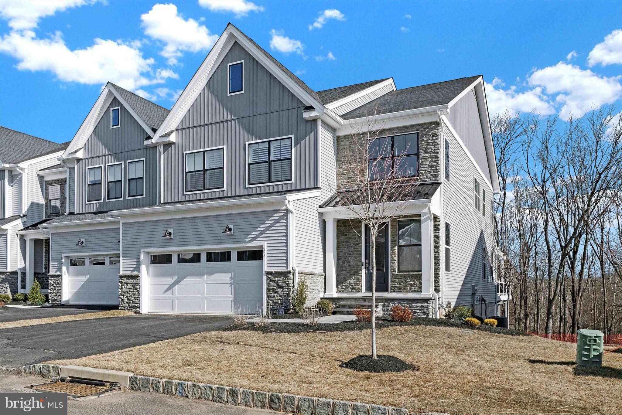 This Derby Elite model, completed in 2024, stands as a beacon of modern elegance and comfort on a premium lot inviting you to make it your own.
Nestled in the heart of Doylestown Walk, 55 Mill Creek Drive stands as a beacon of modern
elegance and comfort. This Derby Elite model, completed in 2024, welcomes you with a
soaring two-story foyer adorned with custom molding, setting the stage for the luxury
within. The expansive great room seamlessly integrates with a gourmet kitchen, featuring a
large island, dual Wolf ovens, and custom cabinetry, making it a culinary enthusiast’s
dream. Adjacent to the kitchen, the dining area opens onto an extended deck, offering
serene views of the creek and lush woods, perfect for both relaxation and entertaining.
Upstairs, a versatile loft provides a cozy sitting area, leading to the primary suite with an
en-suite bath and a spacious walk-in closet. Two additional bedrooms, each thoughtfully
designed with plantation shutters and custom molding, share a well-appointed hall bath.
Convenience is elevated with a second-floor laundry room equipped with modern
appliances. The lower level offers a full bath, a flexible space ideal for a gym or office, and
a generous media room that opens to the outdoors, enhancing the home’s entertainment
potential. Situated on a premium lot with slate walkways and meticulous landscaping, this
residence combines luxury with the tranquility of nature, inviting you to make it your own.
Lot Premium: $150,000 :Upgrades & Design: $380,000; Deck: $75,000
Design/Construction after settlement: $150,000
Inquire for a detailed list of all upgrades and improvements.