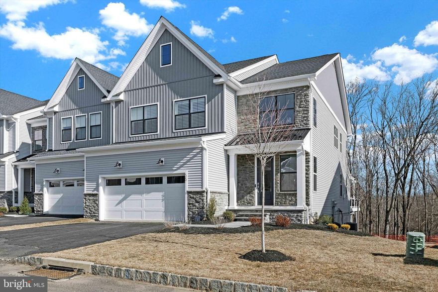 This Derby Elite model, completed in 2024, stands as a beacon of modern elegance and comfort on a premium lot inviting you to make it your own.
Nestled in the heart of Doylestown Walk, 55 Mill Creek Drive stands as a beacon of modern
elegance and comfort. This Derby Elite model, completed in 2024, welcomes you with a
soaring two-story foyer adorned with custom molding, setting the stage for the luxury
within. The expansive great room seamlessly integrates with a gourmet kitchen, featuring a
large island, dual Wolf ovens, and custom cabinetry, making it a culinary enthusiast’s
dream. Adjacent to the kitchen, the dining area opens onto an extended deck, offering
serene views of the creek and lush woods, perfect for both relaxation and entertaining.
Upstairs, a versatile loft provides a cozy sitting area, leading to the primary suite with an
en-suite bath and a spacious walk-in closet. Two additional bedrooms, each thoughtfully
designed with plantation shutters and custom molding, share a well-appointed hall bath.
Convenience is elevated with a second-floor laundry room equipped with modern
appliances. The lower level offers a full bath, a flexible space ideal for a gym or office, and
a generous media room that opens to the outdoors, enhancing the home’s entertainment
potential. Situated on a premium lot with slate walkways and meticulous landscaping, this
residence combines luxury with the tranquility of nature, inviting you to make it your own.
Lot Premium: $150,000 :Upgrades & Design: $380,000; Deck: $75,000 
Design/Construction after settlement: $150,000
Inquire for a detailed list of all upgrades and improvements.