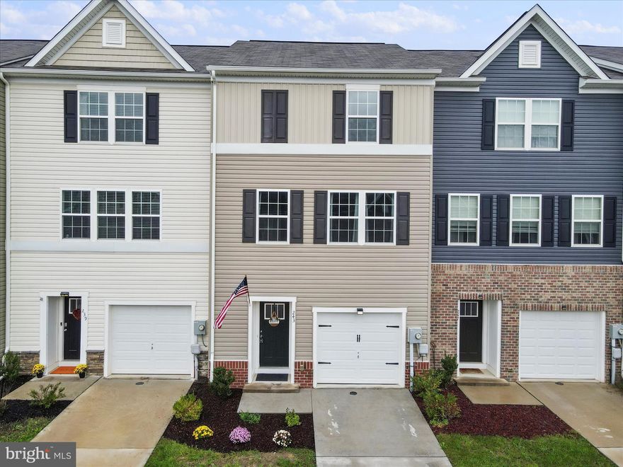 This move-in-ready 3 bedroom 2.5 bath townhome with a single car garage in Spring Mills, WV is in excellent condition with a fenced-in back yard, large concrete patio, and a deck perfect for grilling or relaxing. You couldn't ask for a better location with shopping, restaurants, schools, and Interstate 81 all within 1/2 mile. The entrance to the development is easily accessible and the home is located on a dead-end street. The open floor plan on the main level provides a large living space and has LVP flooring. The kitchen/dining area has granite countertops, an island with a double sink, a pantry, plenty of counter space and cabinets, and a walk-out to the deck. The primary bedroom has an ensuite and walk-in closet. Two more bedrooms, a second full bath, and the laundry area comprise the rest of the top floor. Don't miss your chance to own this move-in-ready townhome, schedule your private tour today.