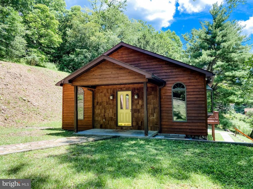 Serene Mountain Living! This 'House on the Hill' is the perfect getaway! The Great Room, complete with Skylights provides a cozy & relaxed atmosphere and the Covered Deck is the perfect place to take in some cool mountain air! Complete with 3 Bedrooms, 1 Bathroom, and a Bright & Airy Dining Room. Recent updates to the furnace & hot water heater! Make your appointment today! **For best access, use Pershing St: To access from rear (Where parking is located) From St 36S: Turn at First Presbyterian Church onto Pershing St. Follow Pershing St until you see the CB arrow off to the left. Follow gravel road to driveway.