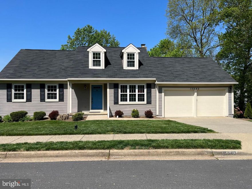 Beautifully updated property in sought after Montclair!  WATER FRONT AND GOLF COURSE LOT!!  Property has approximately 97 FEET OF WATER FRONTAGE!   Fresh paint and carpet throughout!  Updated kitchen with new granite counter tops, new stove, new microwave, recessed lighting and hardwood flooring.  Kitchen walks out to a spacious deck overlooking the lake!  Primary bedroom is on main level and has an attached full bath.  Both main and upper level bathrooms have been totally remodeled!  Upper level also features two bedrooms.  Finished basement has a large rec. room with a wet bar, a full bath, a huge unfinished storage area and sliding glass door out to the back yard!  Yard has private steps leading down to the lake!  You can see West Beach across the inlet and Dolphin Beach is just around the corner.  Montclair has loads of amenities to include a golf course, tennis courts, swimming pools, three beaches, boat storage, ball fields, fishing piers and more!!