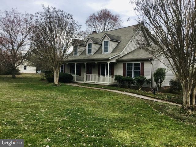 Check out this custom cape code w/ spacious main level open plan offering lots of gathering areas, kitchen with large pantry & laundry area, formal dining, large living room w/ fireplace, doors to decking across the rear of house, level back yard, upper level offers 3 nice size bdrms & 2 full baths including a large master bath. Lots of storage, beautiful culdesac lot backing to trees. Convenient to commuter routes and amenities. Freshly painted, all new flooring, both rear doors to decking are brand new, new refrigerator, no washer & dryer
