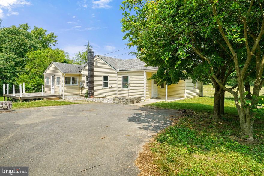 *BACK ON MARKET* This country cottage has lots of potential for the next buyer! 1500 sq. ft. of living space on almost half an acre. Hardwood floors throughout. Stone fireplace in living room. 3 bedrooms, 2 full bathrooms. Bright sunroom off of kitchen. Make it your own! Close to Fair Hill, I95, & only minutes to DE! 
This is an AS-IS sale. Any lender required repairs will be the responsibility of the buyer.