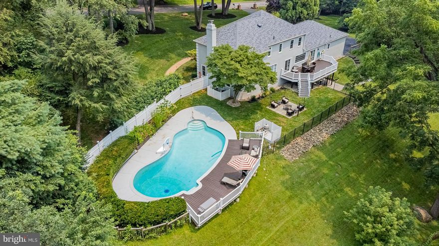 This Beautiful French Colonial house has recently been renovated throughout. 1.4-acre lot offers amazing views in a private setting with swimming pool, sit out area and large deck. 
First floor has living room with fireplace, formal dining room, Study with large picture window, Family room with 10 ft. wide window and a Gourmet chef's kitchen with 9-foot quartz island which is the focal point of the large open floor plan. First floor also has mud room with dog bath. Second floor has a master suite with walk-in closet, master bath has soaking tub and fully integrated advanced technology Toto toilet. There are three additional bedrooms and a hallway bath with double vanity and built-in tub on second floor. The finished lower level has a second family room with sliding doors to rear yard with a half bath. Beautiful deck off the kitchen/family room. Deck overlooks the "valley" as well as the fabulous looking pool area perfect for summer entertaining. Everything is tastefully designed in the house with great attention to detail. All this within 5 minutes of Whole foods, Ellis Preserve, Newtown Square, and Paoli. Recently Renovation includes the following: New Kitchen & Island New Stainless Steel “Viking” Appliance New Hardwood floor in First, Second Floor’s & Stairs New Luxury Vinyl Floor in Basement & Laundry New Drop ceiling panel in Basement New “Pella” Double hung & Picture windows (24) and sliding Door (3), New Roof , New Sump pump, New Air-conditioned (Second floor Unit) New Deck Plank & Railing New “Volt” Landscaping Lights New Pool Deck Railing New Privacy Fence Railing around Pool Sherwin Williams Emerald Interior Paint Sherwin Williams Elastomeric Stucco Exterior Paint New Bathrooms & it’s Hardware including Toto Toilet and soaking tub New Laundry/Mudroom with Dog Bath Lots of Recessed Lights in all three floor New wood work/carpentry Smart Light Switches (compatible with Alexa or google – No Hub required) New Garage Opener New Garage side Door & Laundry Door Washer/Dryer (2 years Old) Fully Renovated 2 Car Garage with Epoxy Floor Over $380,000 was spent for renovation, Excellent value for money , schedule your showing today.