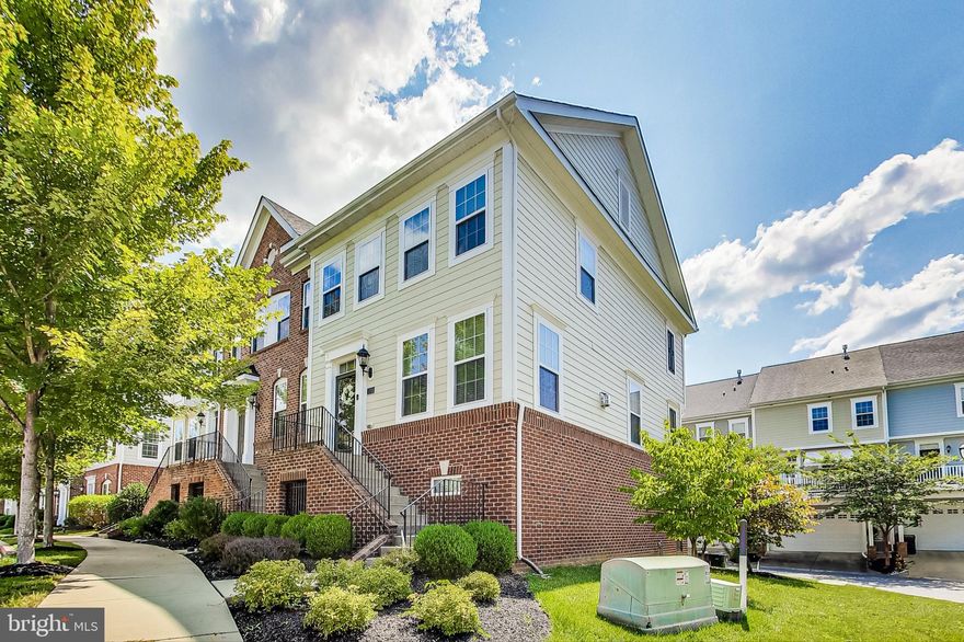 3 level home has 3 bedrooms, 3 full baths and 1 1/2 bath. There is NO Carpet in this loved end unit townhome. The basement level features an open layout for an office or a small gym... the option is yours.  It also has a full bath as well as access to the two car garage. The main level features an inviting and expansive living room that includes a gas fireplace, tons of natural light and an easy flow for entertaining. The open kitchen features a large island with stainless steel appliances and granite countertops. There is a composite deck off the kitchen too. The upper level features a large primary bedroom and attached bath with walk in closet. There are 2 more spacious bedrooms, a large full bath in the hall shared among the two other bedrooms. The laundry area is also upstairs for ease of laundry. remember to view the virtual tour and floor plan to see all these great features.  Amenities include swimming pool, clubhouse with fitness center, playgrounds, fountains, and scenic trails, snow removal & more! This home is conveniently located near shopping, dining, entertainment, National Harbor, DC & VA! Perfect for commuting to Andrews AFB, Bolling AFB, PAX River & Indian Head Naval Base. Schedule to see it quickly before it is gone.