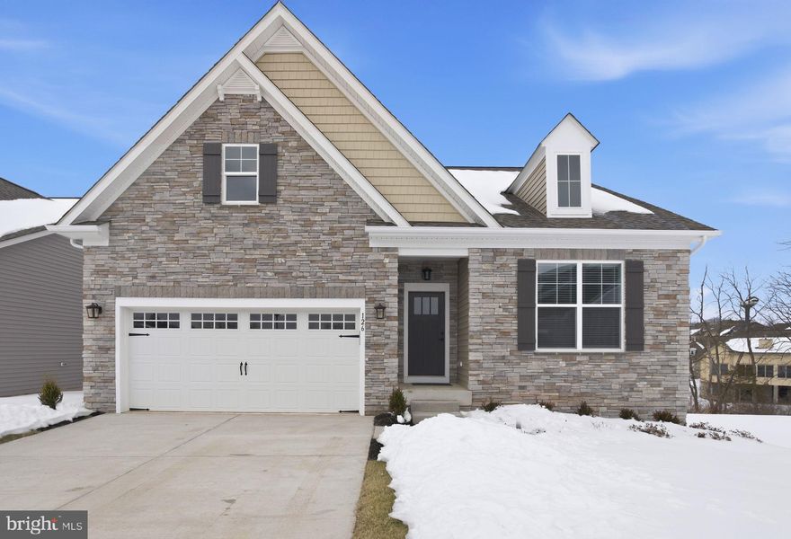Welcome to Wade Run at The Links at Gettysburg, where the stunning Patton floorplan is fully finished and ready for immediate move-in. This thoughtfully upgraded ranch-style home with loft offers the perfect blend of main-level living, flexible space, and future potential—all set within the scenic and historic surroundings of The Links at Gettysburg.

Designed for comfort and convenience, the main level features a private owner’s suite complete with a spacious walk-in closet and en-suite bath. A centrally located laundry room and powder room add everyday ease, while the front “Choice Room” provides the flexibility for a home office, study, or cozy den.

The heart of the home showcases true open-concept design. A gourmet kitchen with stainless steel appliances—including the refrigerator—flows seamlessly into the great room, where a gas fireplace creates a warm and inviting focal point. A 2-foot rear extension and light-filled sunroom enhance the sense of space, making this home ideal for both entertaining and daily living.

Upstairs, a versatile loft offers two additional bedrooms and a full bath—perfect for guests, family, or extended stays with added privacy.

The walk-out basement provides an expansive unfinished footprint ready to accommodate your vision—whether that’s a home gym, theater, workshop, or additional living space.