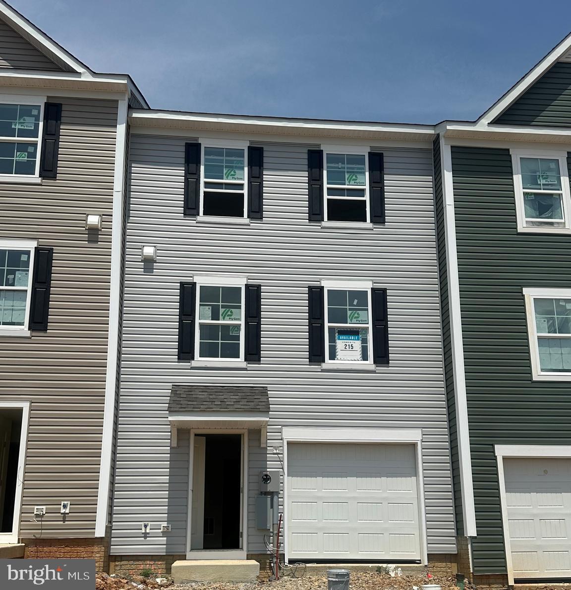 This Sterling Gray York II garage townhome offers 3 bedrooms, 3.5 bathrooms, luxury vinyl plank flooring throughout the 1st floor and a finished lower level. The open concept first floor offers a spacious living room and a well-appointed kitchen with a large kitchen island, upgraded white mission style kitchen cabinets with white quartz countertops, satin nickel finishes, and stainless-steel appliances, pendant lighting and much more. Minimal outdoor upkeep with lawn care included. *Photos may not be of actual home. Photos may be of similar home/floorplan if home is under construction or if this is a base price listing.