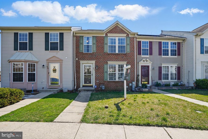 Welcome to this spacious and beautiful 4-bedroom, 1.5-bath brick front townhome in the sought-after community of Lohr’s Orchard! This home offers three levels of living space, featuring bump-outs on both the main and lower levels for added square footage.  Step inside to a bright and inviting spacious living room leading to an open-concept family room off the eat-in kitchen—perfect for entertaining. The kitchen boasts gas cooking and easy access to the deck overlooking a fenced backyard that backs to woods and a common area for added privacy. The entire first floor has beautiful luxury vinyl plank flooring.   Upstairs, the large primary suite features a generous walk-in closet, while two additional bedrooms provide plenty of space for family or guests. Enjoy the fully finished lower-level recreation room with luxury vinyl plank flooring, an additional bedroom, rough-in for a full bath and access to the backyard. Additional highlights include brand-new carpet throughout, fresh paint, and a newer hot water heater. With gas heating for efficiency and comfort, this home is move-in ready! Don’t miss your opportunity to own this beautiful townhome in a prime location! Schedule your showing today!