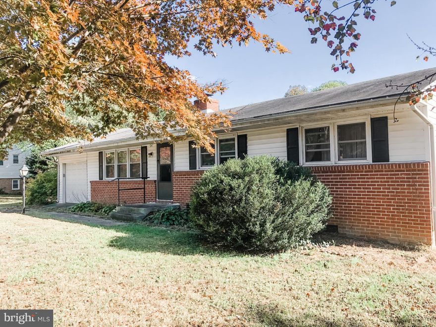 Classic rambler with an awesome level fenced yard. Needs some updating but nice floor plan with hardwood floors through out. Priced  for a quick no hassle sale - Selling AS IS- seller will not be making any repairs.