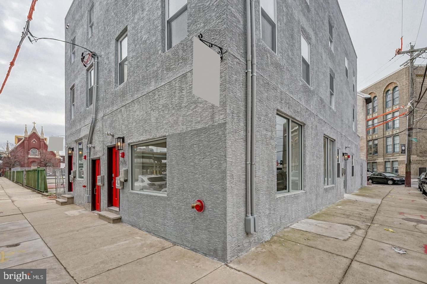 Welcome to 1072 N Front Street – Renovated Mixed-Use Property in Northern Liberties. This corner property features a spacious first-floor commercial space with high visibility, ideal for a variety of business uses. The upper floors include two residential units: Unit 1: 2 Bed / 2 Bath & Unit 2: 2 Bed / 2 Bath. Interior features include laminate hardwood flooring throughout and kitchens with stainless steel appliances, tile backsplash, and quartz countertops. Property includes separate electric service. Located on a busy corner in Northern Liberties, with easy access to public transportation and area amenities. Taxes and square footage is the responsibility of the buyer to have verified.