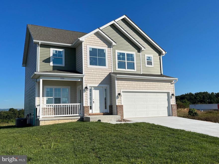 Builders Model Available, Immediate Delivery...5 Bedroom, 4.5 bath colonial features 9ft ceilings main level, Granite countertops, stainless steel appliances, and pantry in kitchen, formal/ separate dining room, Gas Fireplace in large Family Room, & sunroom leading out to rear deck.  Primary bedroom w/ WIC & spacious bath w/ tile shower and soaking tub.  Full finished basement w/ 5th bed, full bath, & rec room included, Brick front & front porch. 2x6 energy efficient construction. Builder offering up to $10,000 close assist with use of preferred lenders