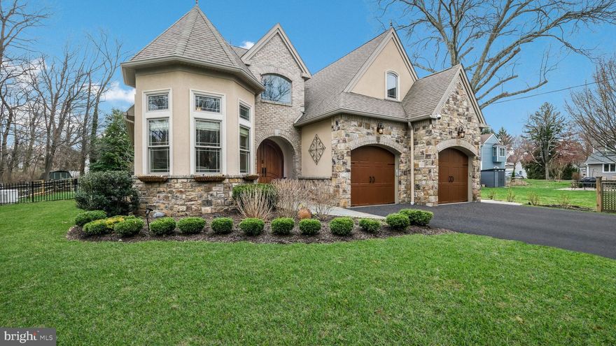 This unique Doylestown home is an elegant French Country Retreat! A perfect blend of character, charm & modern luxury...located in the Borough of Historic Doylestown, Bucks County!  Picture Yourself Here:  discover the timeless elegance of this expertly designed home, offering 4 to 5 bedrooms, 3 1/2 baths and an unparalleled blend of classic sophistication and state-of-the-art technology.  248 Avenue A is nestled in a secluded location, just a short stroll from downtown Doylestown's shops, restaurants, theater, schools, the library, the transportation center, the hospital and more!  Highlights include Brazilian cherry floors throughout (newer on upper level), lovely Living Room with stone gas fireplace, luxurious main floor primary suite with private entrance to patio, gourmet Kitchen with Verona Italian gas (propane) 5 burner range with custom hood, stunning turret-styled Dining Room  with custom built-in cabinetry/wine fridge and 13+ foot ceiling,  main floor laundry, private office space (with closet), security system, whole house generator and more.  Upstairs you'll find 3 spacious bedrooms, Jack & Jill suite, a hall bath, 2 loft areas and a huge bonus room suitable for a myriad of uses, including a theater room or potentially bedroom 5 (there is no closet.)  
Pride of ownership is evident inside and out as this home was crafted with exemplary materials and superior systems.  It is a smart home and it seamlessly integrates modern conveniences efficiently and effectively.  Spacious and sun-filled  interior rooms are bathed in natural light, featuring exquisite craftsmanship, high-end finishes, and an inviting ambiance that exudes warmth and refinement.  Unfinished basement with storage shelves, plumbed for bath and an egress to side yard.  There is an attached 2 car garage with insulated doors PLUS a detached 1 car garage with a separate driveway located on the other side of the front yard.  Don't miss the covered rear porch with fireplace and TV, patio, and fenced rear yard.  Exit the fence gate, cross over the bridge and access the detached garage with workshop!  
WOW.....Whether you’re relaxing in the beautifully designed living spaces, entertaining in the chef’s kitchen, or out on the porch/patio enjoying the serenity of the landscaped grounds, this home offers the perfect balance of luxury and comfort in a truly special, unique and idyllic setting in the Boro!
Experience elegance, convenience, and modern living in a residence designed to inspire. A rare opportunity to own a masterpiece built with thought, integrity and imagination! This one is a MUST SEE!  Welcome Home!  Schedule your showing today!