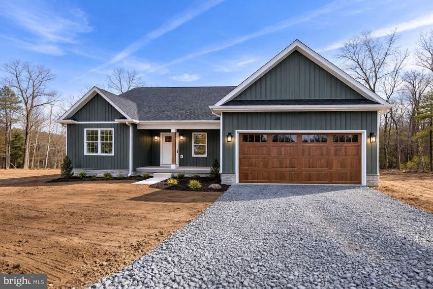 May 5th 2026 delivery on this New ranch home  with Potomac River Access!!!

This 1,670 square foot Ranch style home boasts the sought after split bedroom design. The kitchen / dining combo is open to the expansive great room and features vaulted ceilings. Granite, ceramic, luxury vinyl plank flooring, carpet and stainless steel appliance package. Primary bath has a separate tiled shower and soaking tub. 

Home is larger than it looks providing maximum usage of interior space. The front porch is great for evenings relaxing in a country setting that is close to amenities!

Buyer pays transfer tax stamps. Measurements are approximate. The pictures will be similar to your new home.

Symphony Lane and the driveway will be improved with new gravel when construction has been completed on the new homes. 

"Please note: The photos shown are of a similar completed home. The specific home may vary in floor plan, finishes, or upgrades. The builder reserves the right to substitute materials that may not be available to avoid delays."