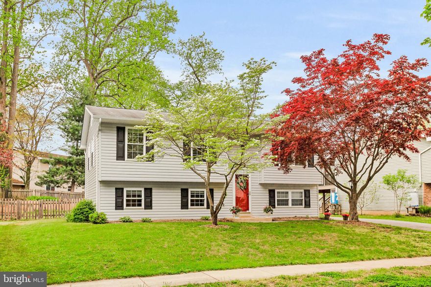 Welcome to 1142 Neptune Place, where charm, updates, and community all come together in one perfect package.

This 3+ bedroom, 2 full bath split-level home in the heart of the Broadneck Peninsula offers a flexible layout that fits your lifestyle—whether you're working from home, need space for guests, or just want room to grow. With fresh paint throughout, new carpet on the lower level, and luxury vinyl plank flooring upstairs, this home is move-in ready from day one.

Walk upstairs and you will see the light-filled family room, which is adjoins to the dining room, and updated kitchen.  Walk out to the expansive deck, perfect for summer BBQs, playtime, or just relaxing under the stars.

The main level offers three spacious bedrooms and a full renovated bath, while the lower level includes a bonus bedroom, full renovated bathroom with glass shower, and rear entry—ideal for in-laws, guests, or a quiet home office. Step outside to a large area for a screened porch (under the deck) and a private, fenced backyard.

Located in the Broadneck school district and part of the water-privileged Atlantis neighborhood, you’ll enjoy access to the community pier on the Magothy River, nature paths, and gathering playground.  All with easy access to DC/Baltimore commuter routes, downtown Annapolis, and the best of coastal living.
Come see how this Neptune Place gem checks all the boxes for comfort, convenience, and community.