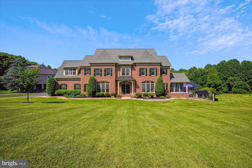 Welcome to your dream home.  This light filled masterpiece by Craftmark Homes sits on gently sloped lot backs to trees and parkland.  Located in a Cul-de-sac next to the community land, it further expanded your treelined view on the back right side.   The covered front door leads you through a 2-story foyer, fully expands your view to the magnificent 2-story family room, huge living room, light drenched sunroom.   Going up the curved stairs and looking through the double door, you will get further excited to see the huge primary bedroom with vaulted ceiling, 3 side fireplace separating bed area from a light filled sitting area.  The big size primary bathroom has his and her sink sit on 2 sides with a nice tub line up on the front side.  Each of the 3 other bedrooms has its private bathroom.   Your excitement will be further enhanced by going to the loft with skylight in the play area, a full bath and a bedroom.   Coming down to the basement level, you will see a theater room, a big recreation area, a dance area with full wall mirror, a bedroom on the back with the treelined view.  If you enjoy cooking, there is also a food workshop on the main level in the Mud room area.  If you like to party and entertain, there is a full bar/summer kitchenet in the basement.  

The solar system on the back right side of the house will be removed before closing.